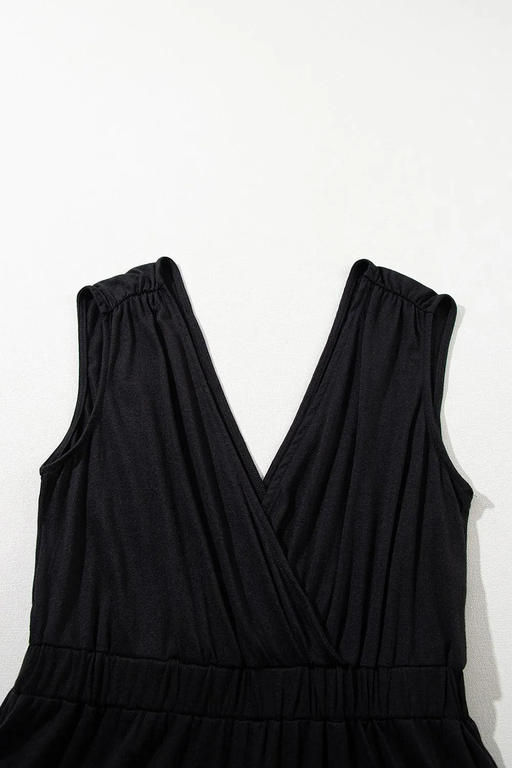 Black Jumpsuit with Backless Plunging Neck and Spaghetti Sleeve Wide Leg Pants