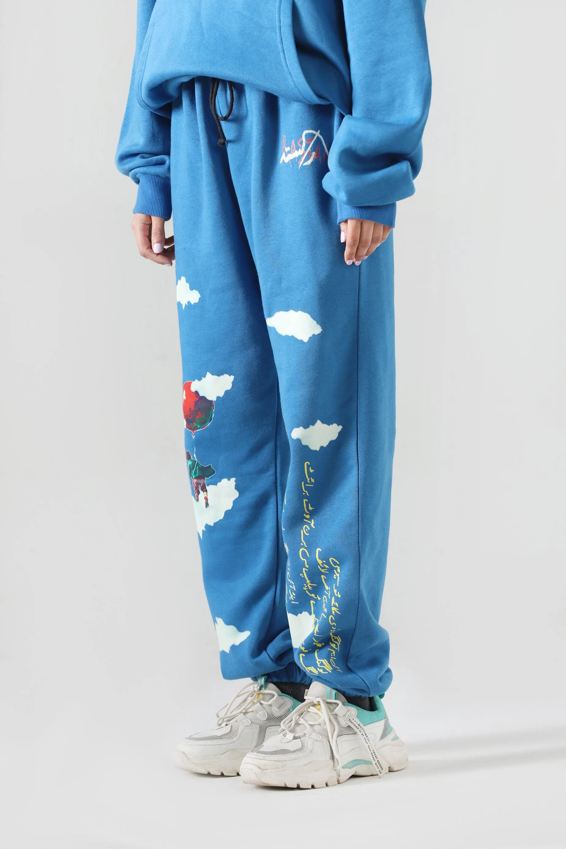 "LEARNING TO FLY" SKY BLUE SWEATPANTS