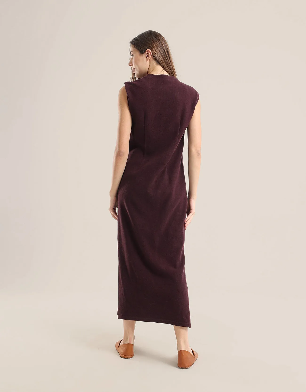 Sleeveless long dress with side slits