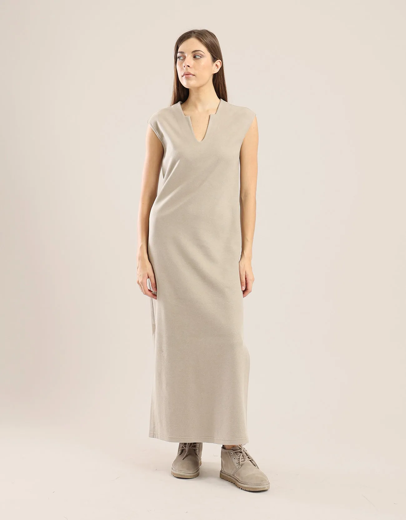 Sleeveless long dress with side slits