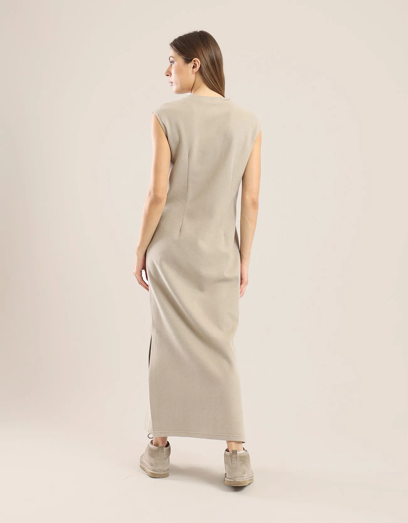 Sleeveless long dress with side slits