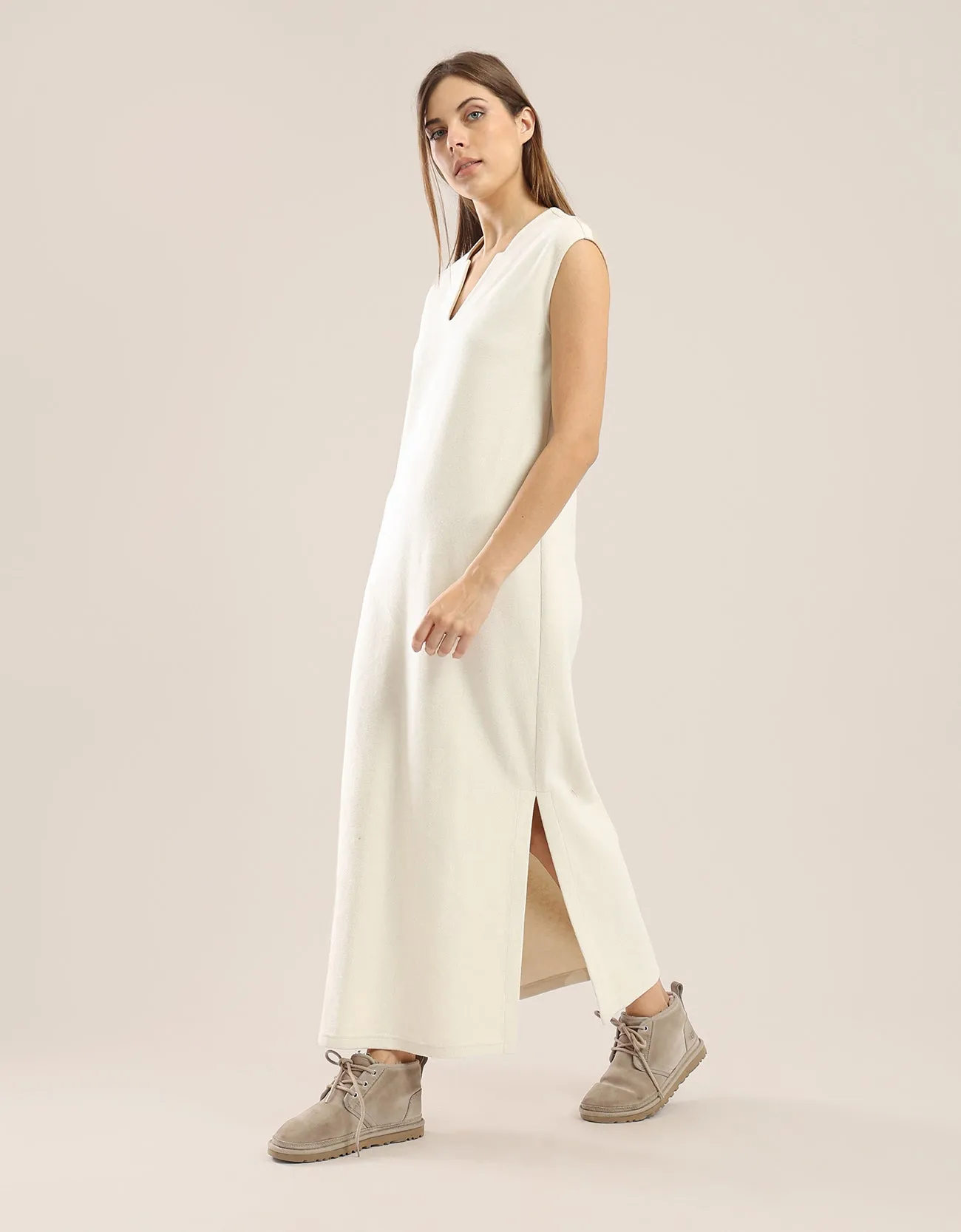 Sleeveless long dress with side slits