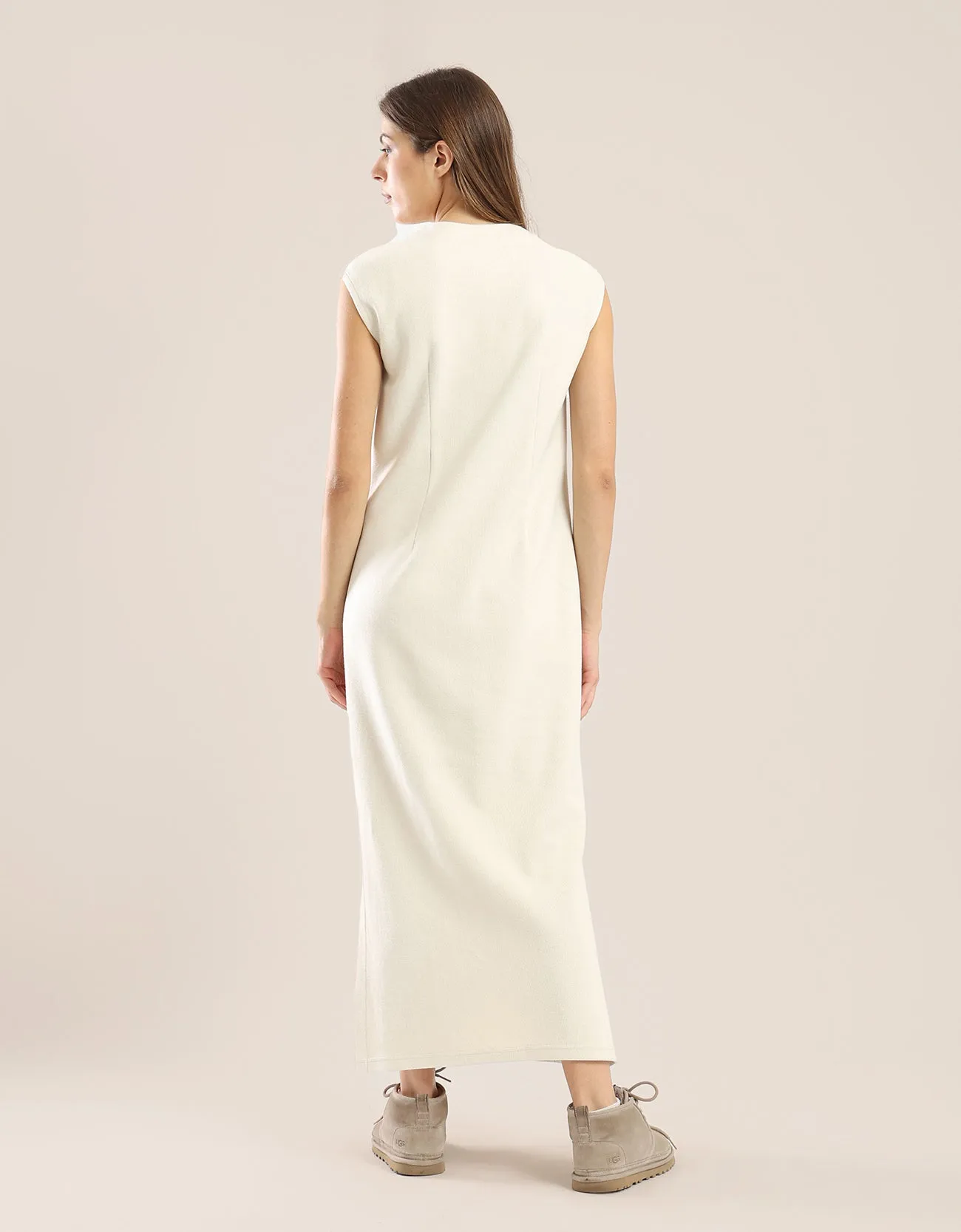 Sleeveless long dress with side slits