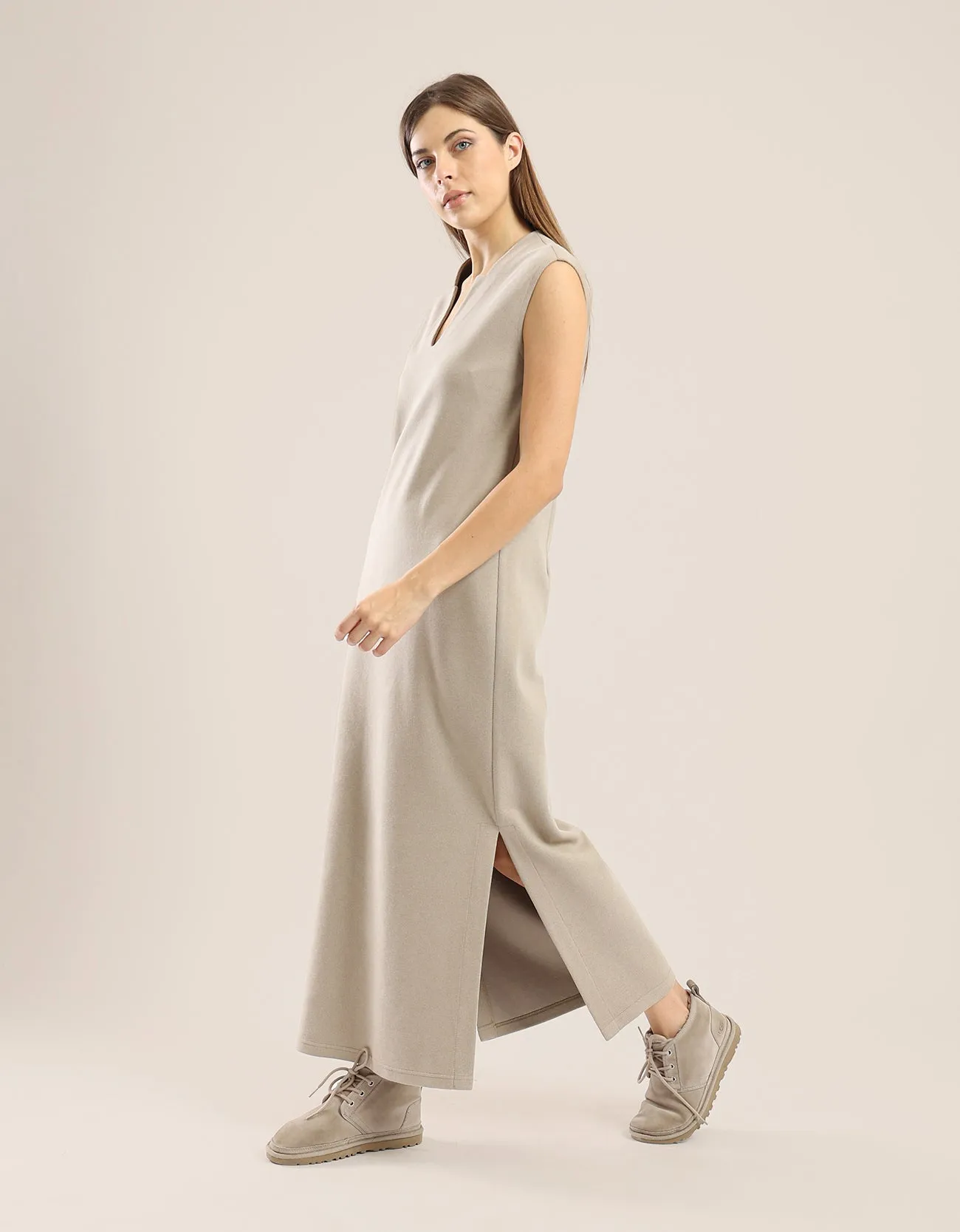 Sleeveless long dress with side slits