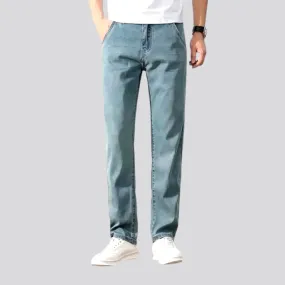 Thin men's stretch jeans