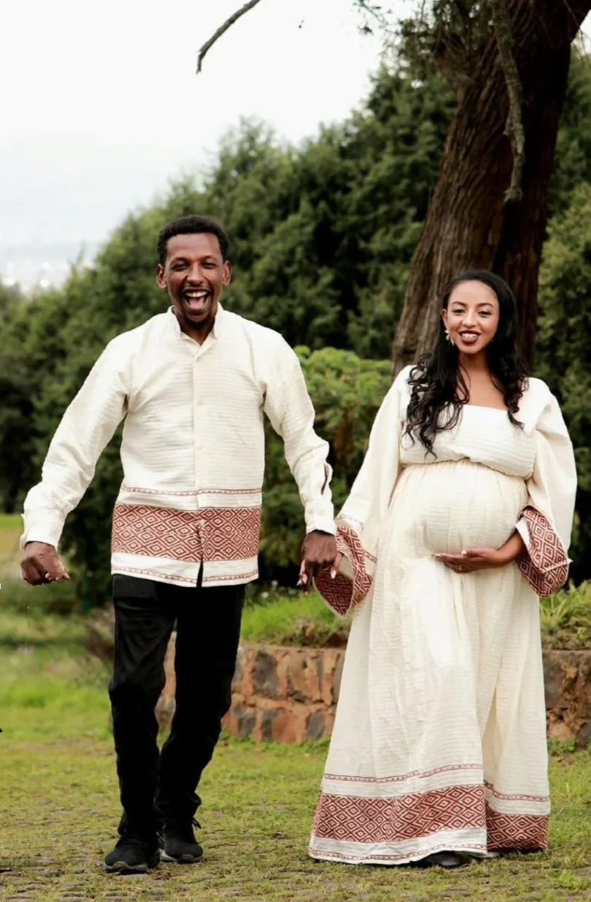 Timeless Elegance in Cream and Red Matching Habesha Attire: Modern Traditional Ethiopian Outfit for Couples